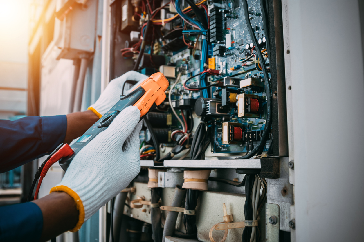 Electrician Checks Switch Board